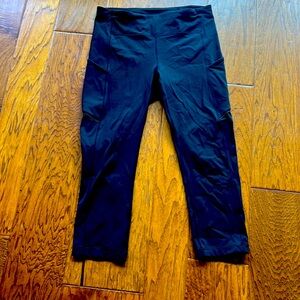 Selling Lululemon crop leggings size 8 in black-zipper on back.great condition